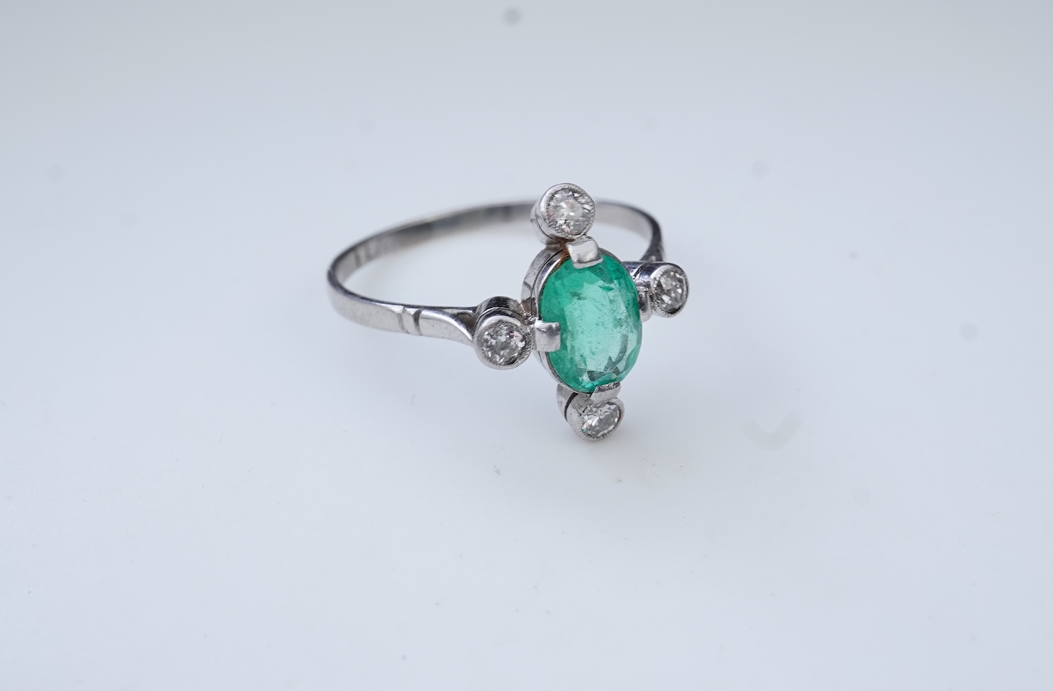 An Art Deco emerald and diamond ring, first half 20th century
